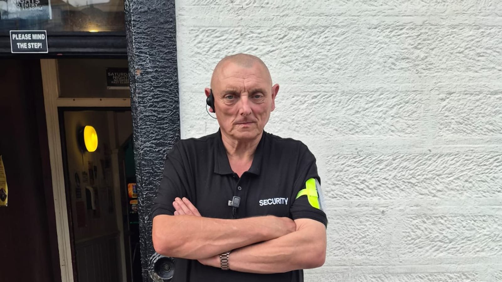 A Border Security Ltd door supervisor on duty outside a licensed venue in Carlisle